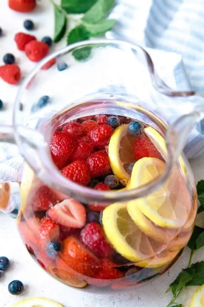 up close photo of berry rosé sangria pitcher