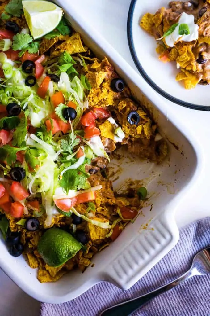 chicken taco casserole with all of the toppings