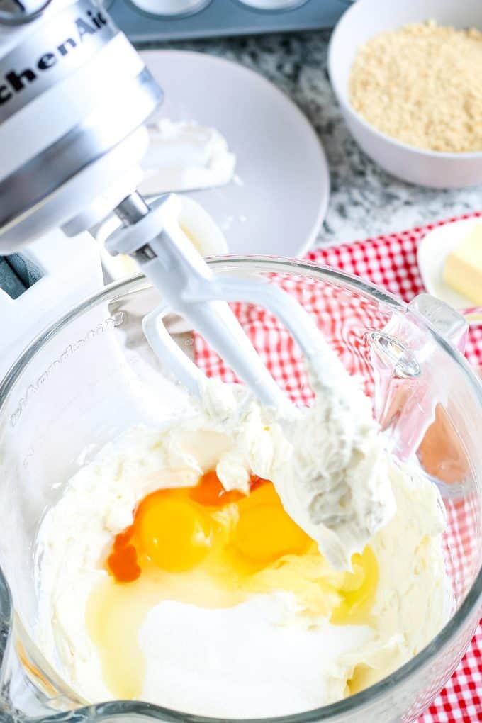 stand mixer filled with processed mini cheesecake ingredients