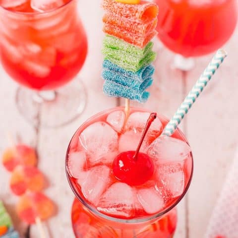closeup photo of kid-friendly mocktail garnished with a candy skewer