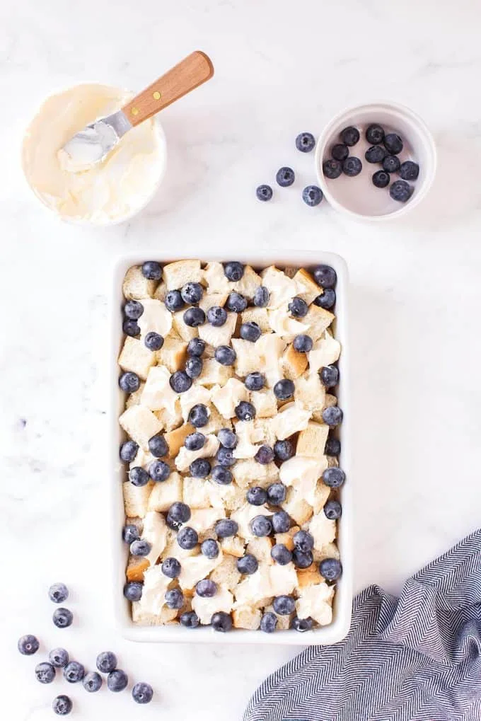 fresh blueberries, marscapone and blueberries in a baking dish