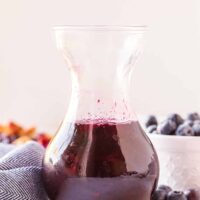 glass jar of delicious blueberry syrup