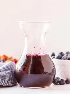 glass jar of delicious blueberry syrup