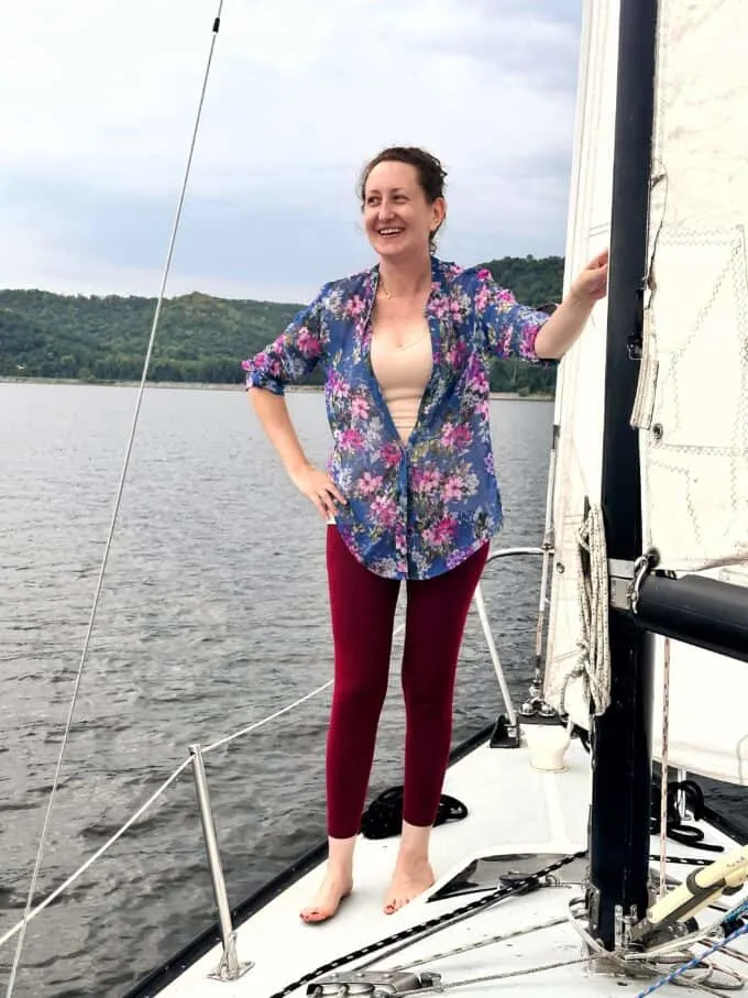 Jenny Bullistron, owner of The Thirsty Feast and Honey and Birch, on a sailboat on Lake Pepin in Western Wisconsin.