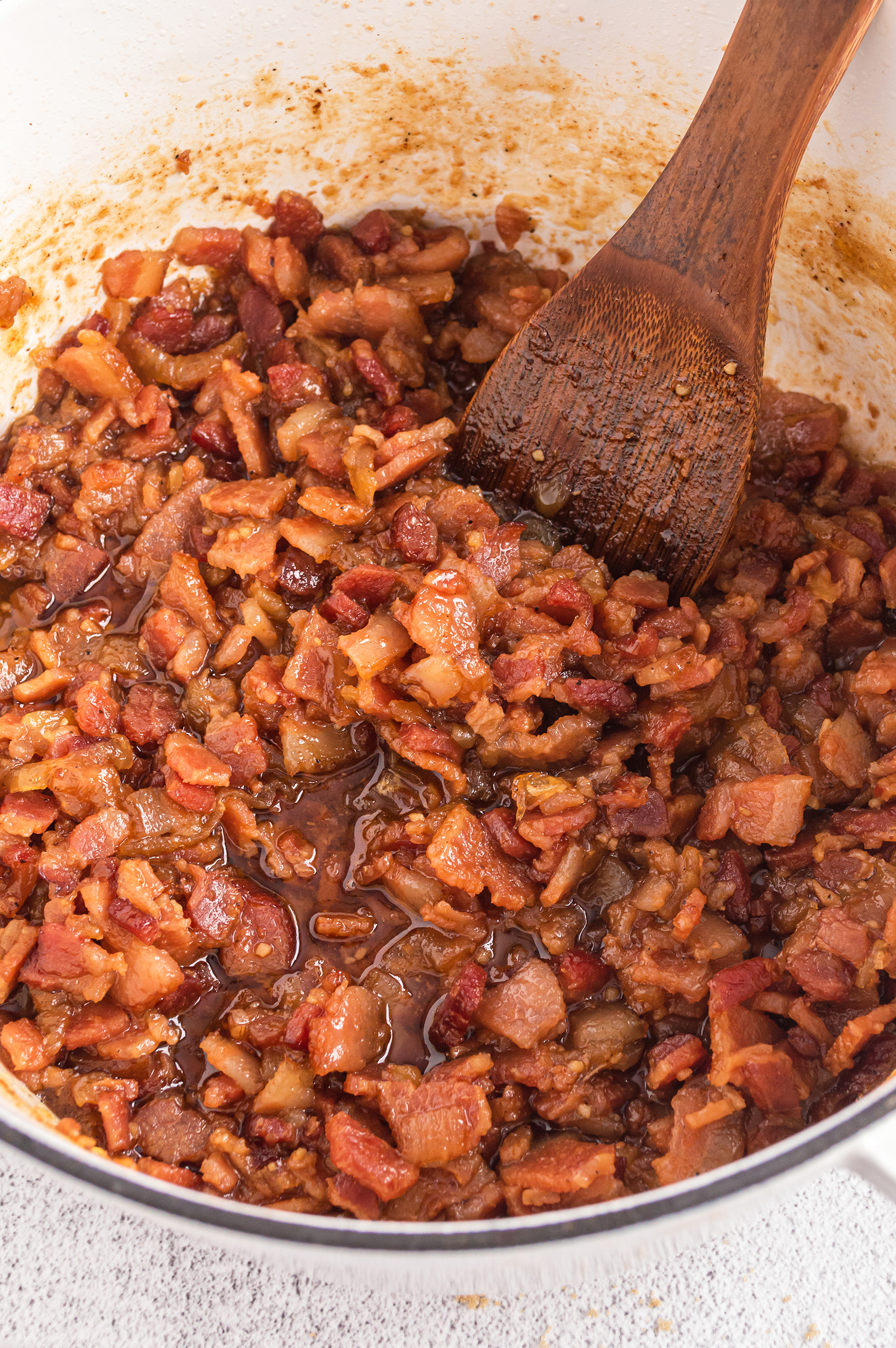 bacon being crisped in a dutch oven