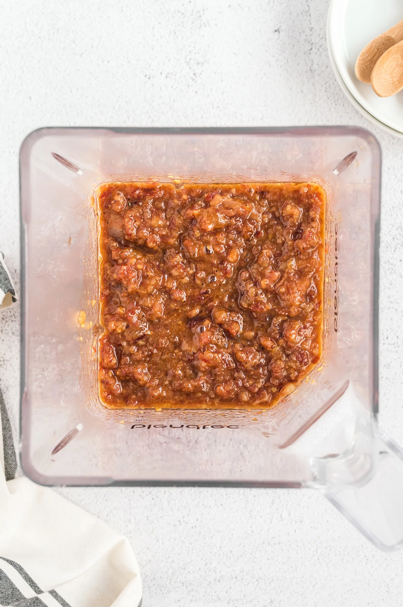 a blender full of pulsed bacon jam to make it smoother and more spreadable
