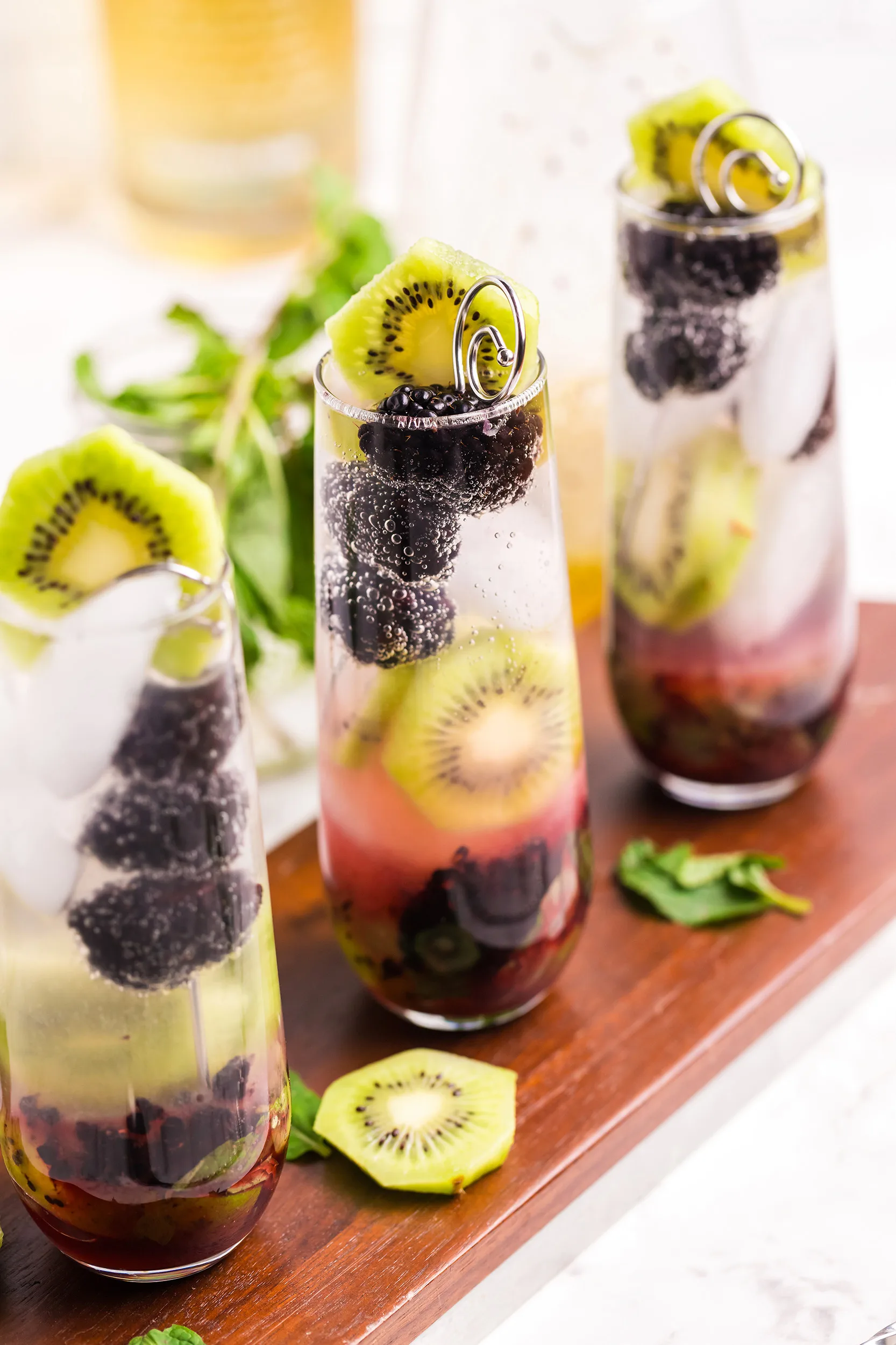 https://www.honeyandbirch.com/wp-content/uploads/2023/12/blackberry-kiwi-mojito-recipe-20.jpg.webp