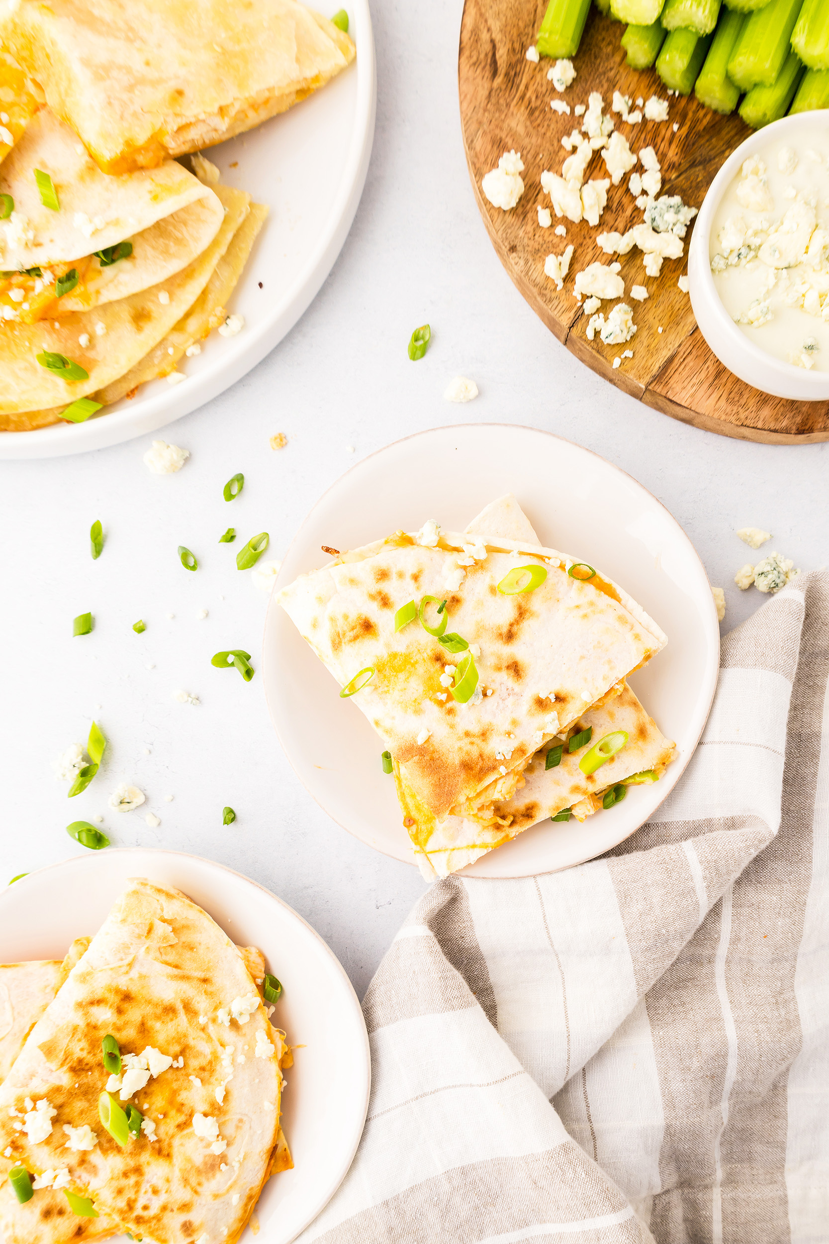 buffalo chicken quesadilla spread complete with dipping sauce and celery