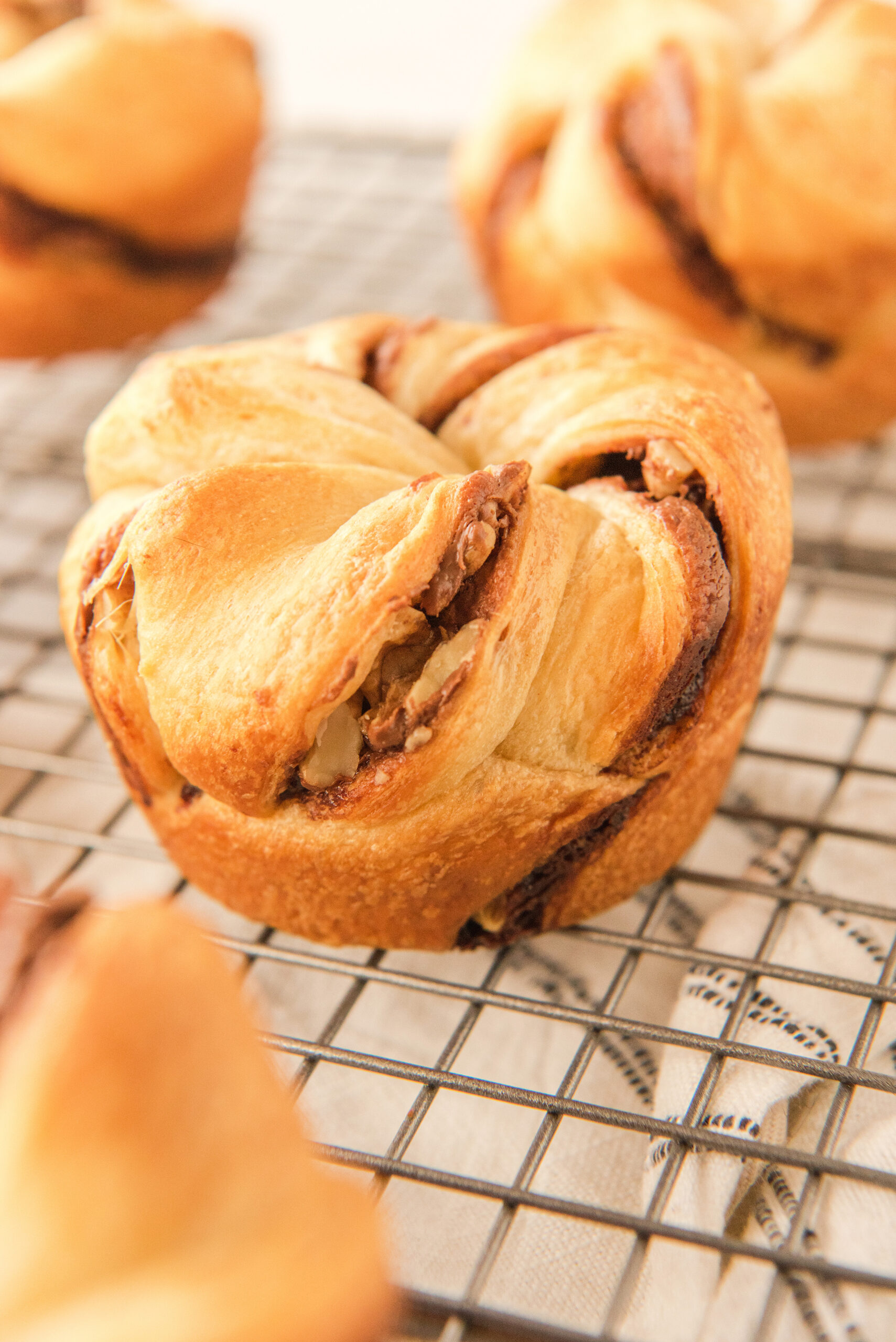 nutella and walnut muffin on a cooling rack