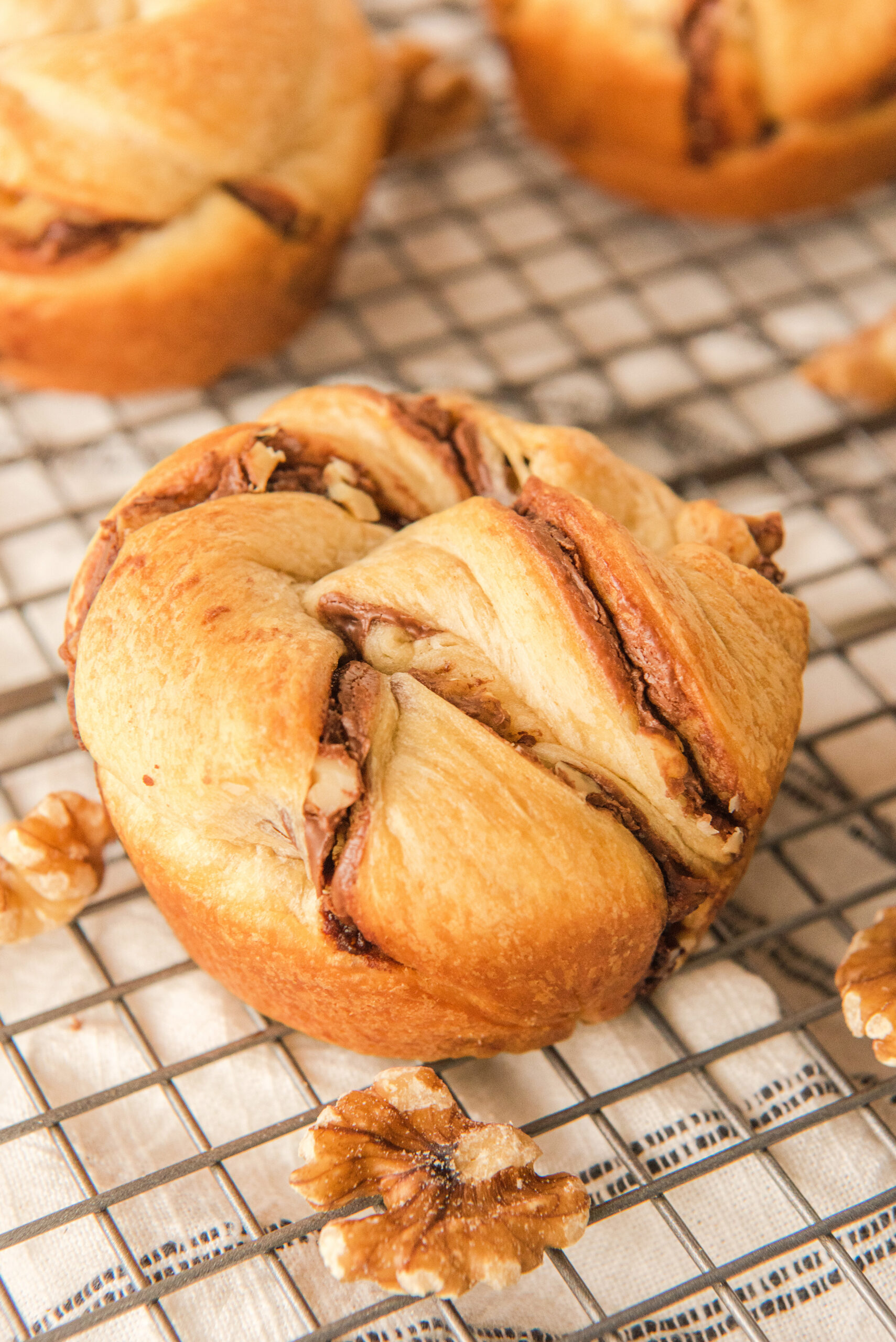 closeup photo of Nutella muffin on a wire rack