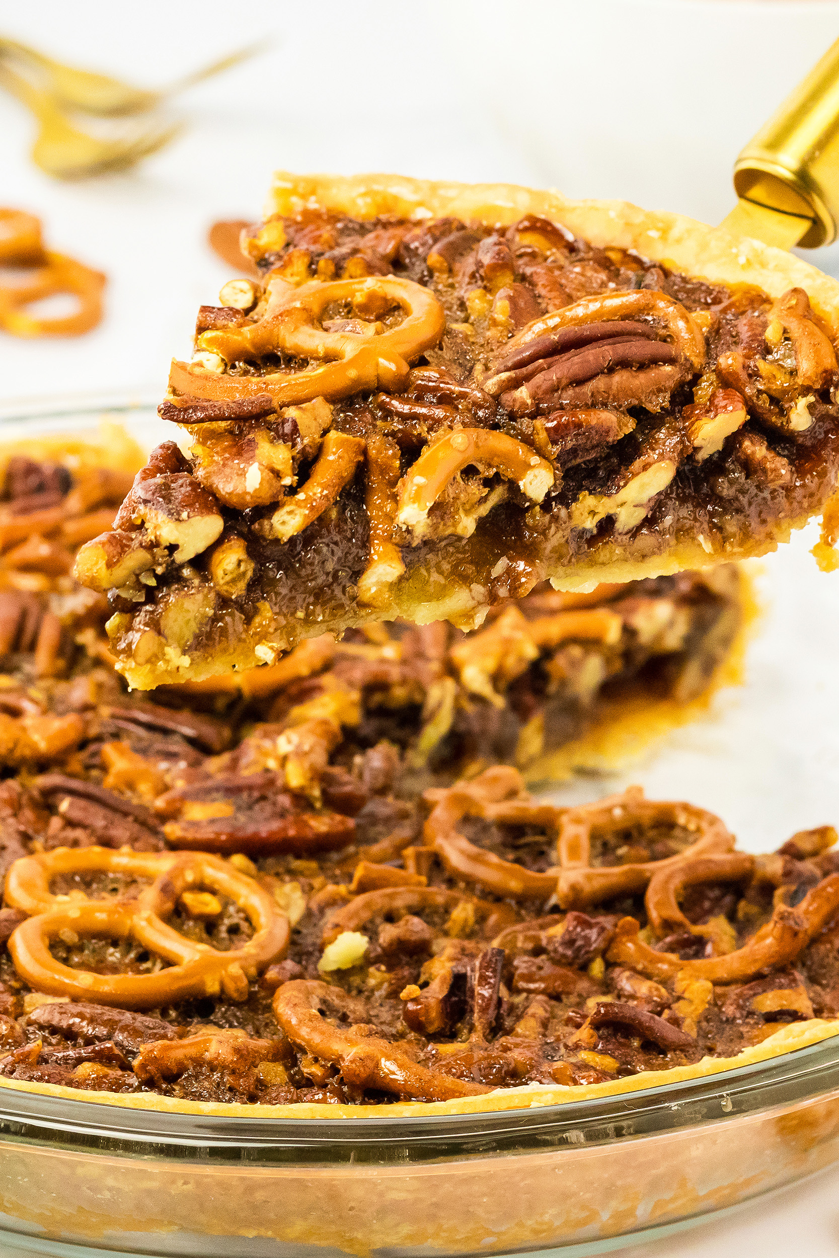 piece of pretzel pecan pie on a serving tool