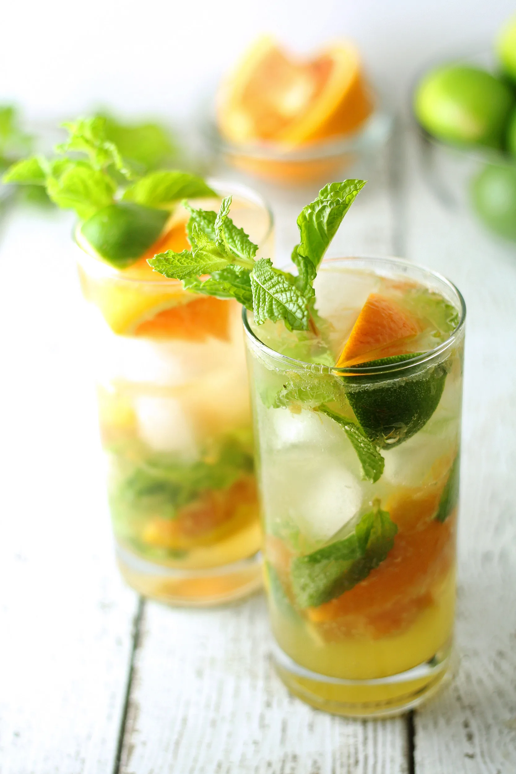 orange mojitos on a wooden board