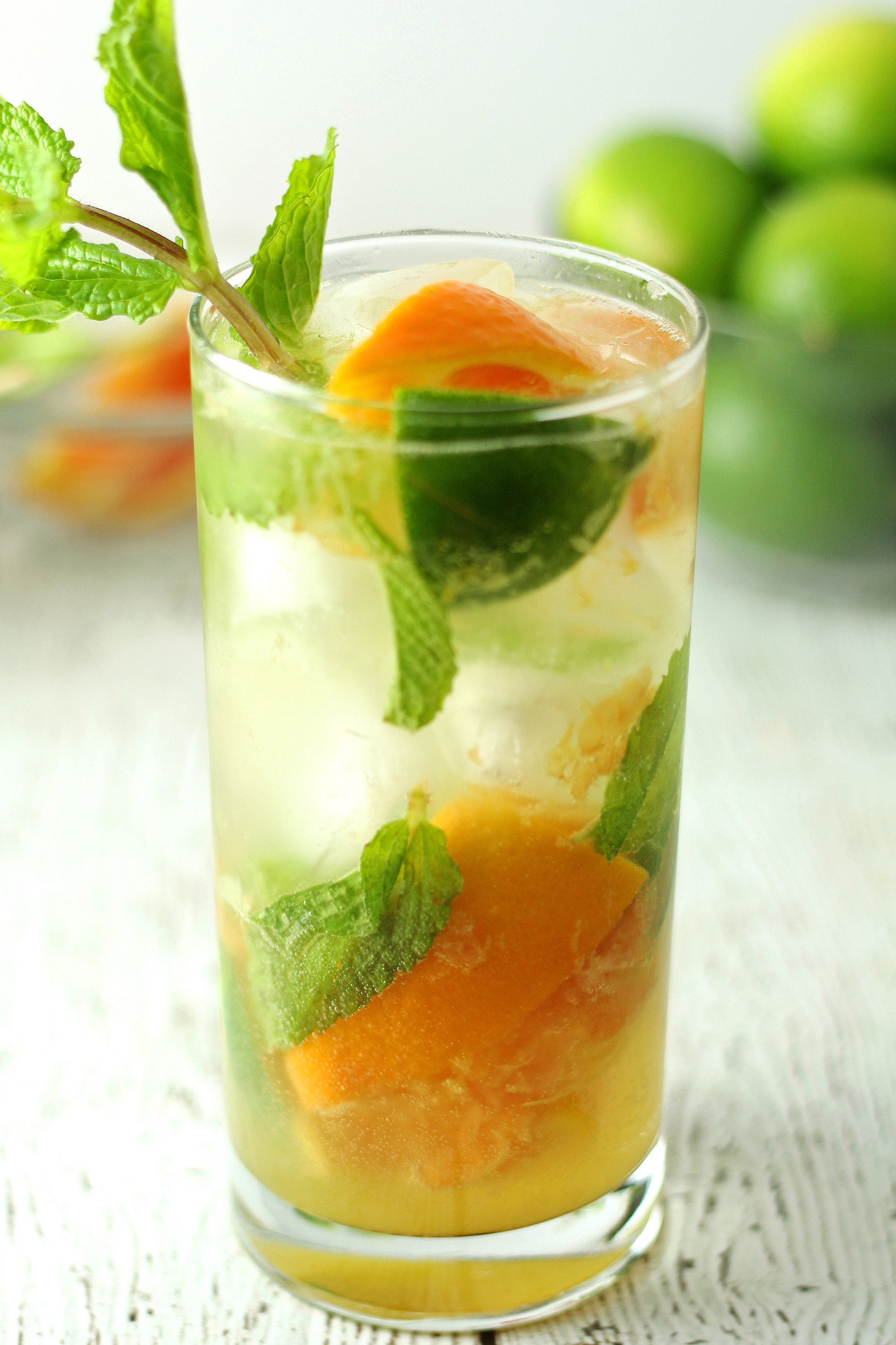 prepared orange mojito recipe in a tall glass