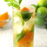 orange mojito in a large glass