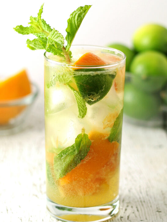 orange mojito in a large glass