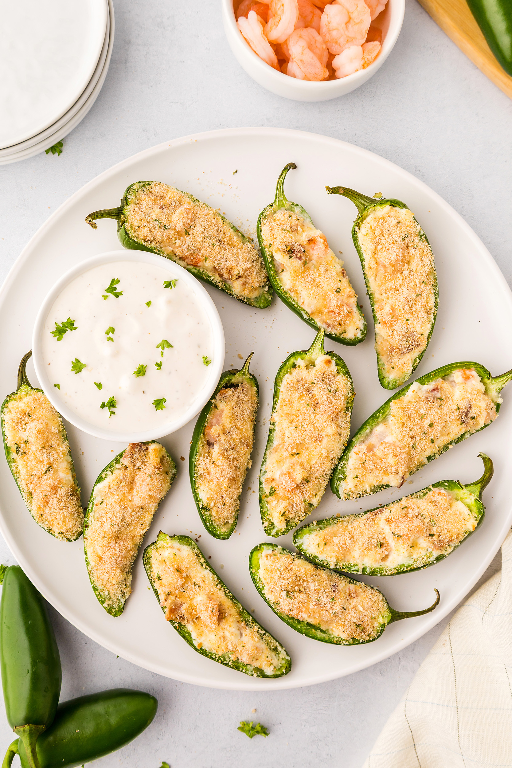 overhead plate of 12 shrimp jalapeño poppers and ranch dressing