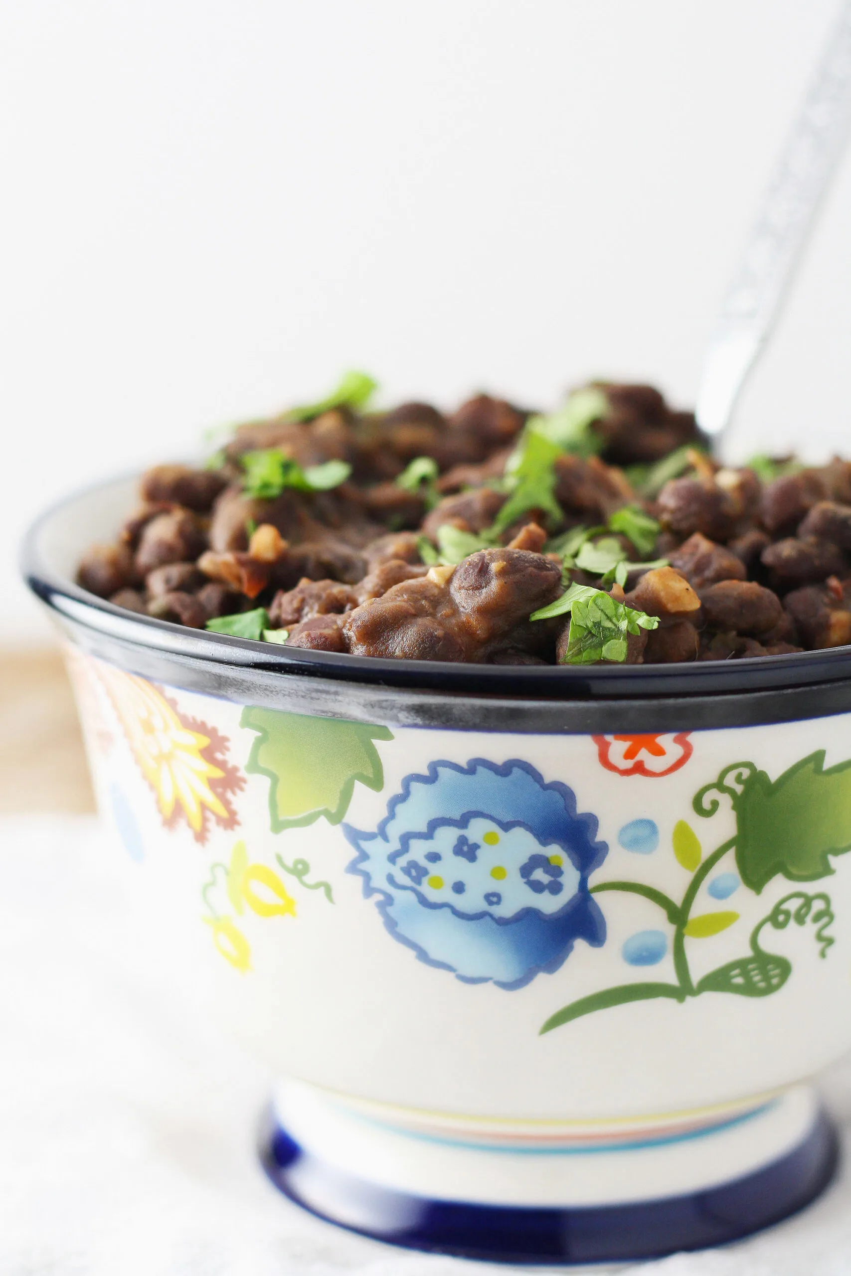 black beans side dish topped with cilantro